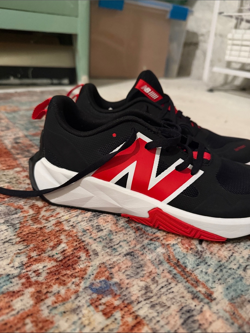 New Balance Kids Black and Red Athletic Sneakers with White Midsole